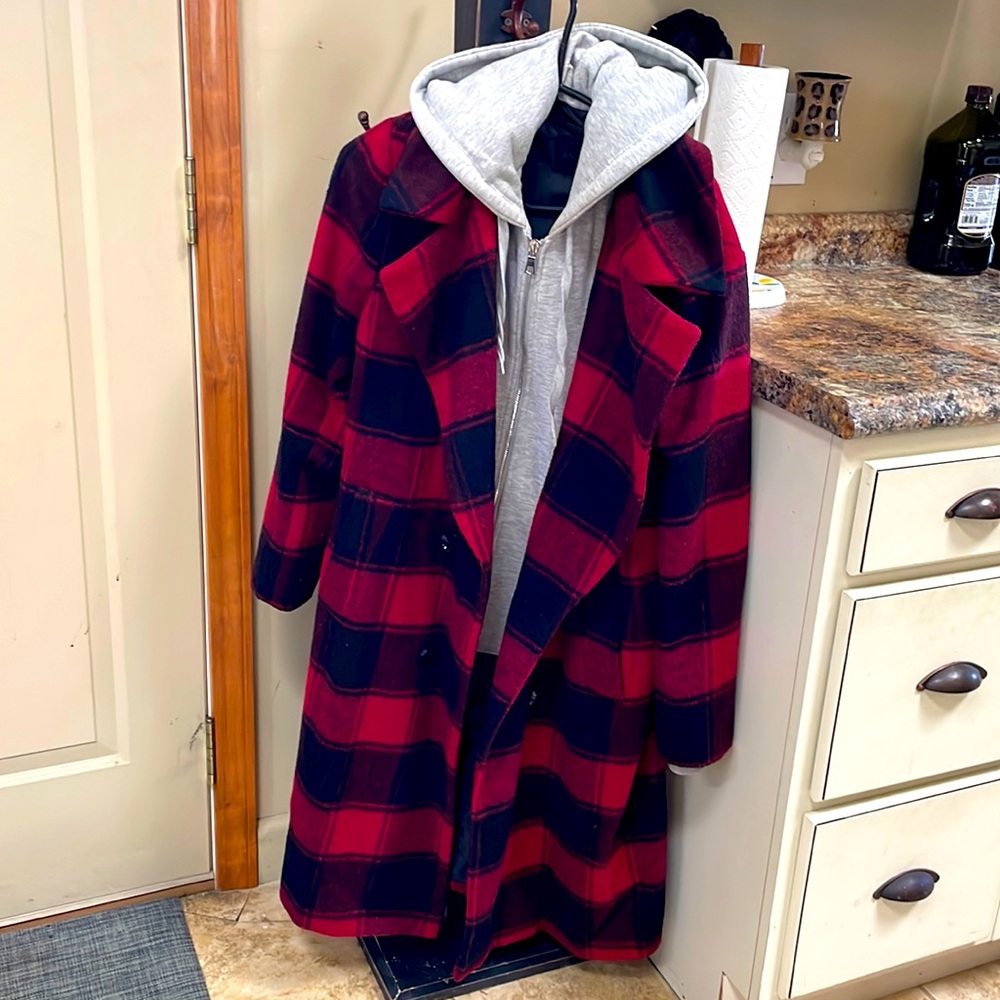 Kendall + Kylie wool coat with hooded sweatshirt under layer.